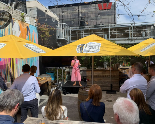 cath on stage at profitability event